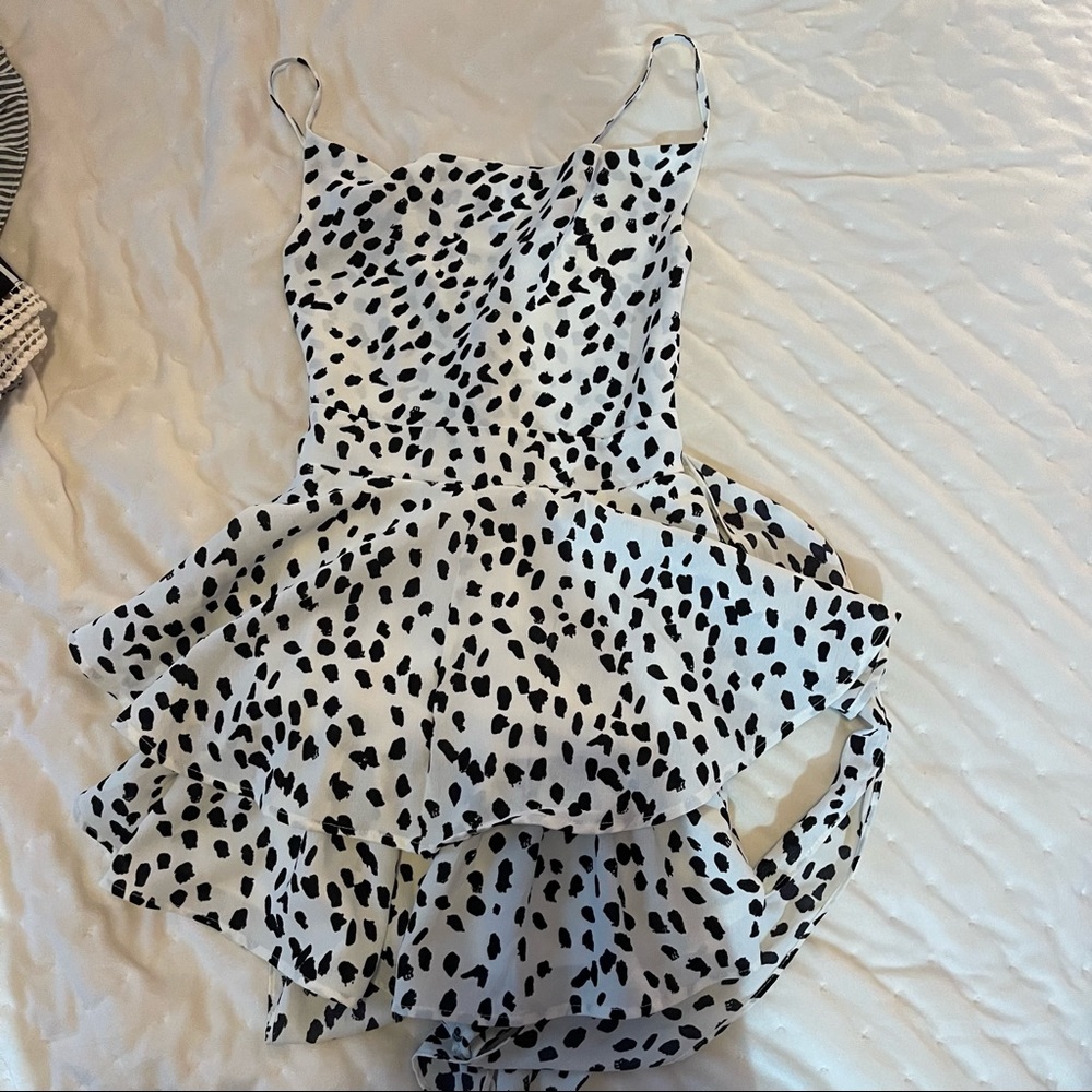 Lizard thicket Black and white polka dot romper